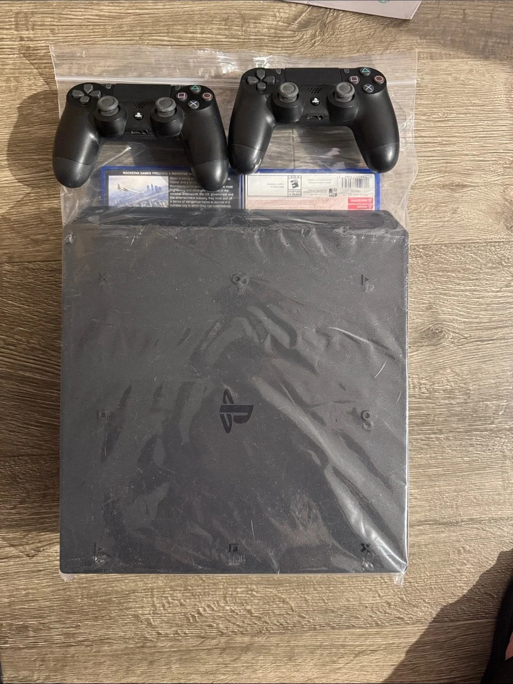 Sony PlayStation 4 Slim Matte Black Console with Two Black DualShock Controllers